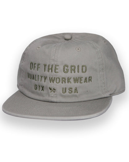 Off The Grid Surplus plated hat in eucalyptus color, showcasing a stylish and durable hat for outdoor wear.