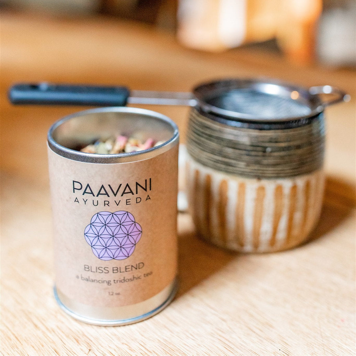 Paavani Bliss Blend Tridoshic Tea in a simple package, promoting relaxation and harmony with natural herbal ingredients.