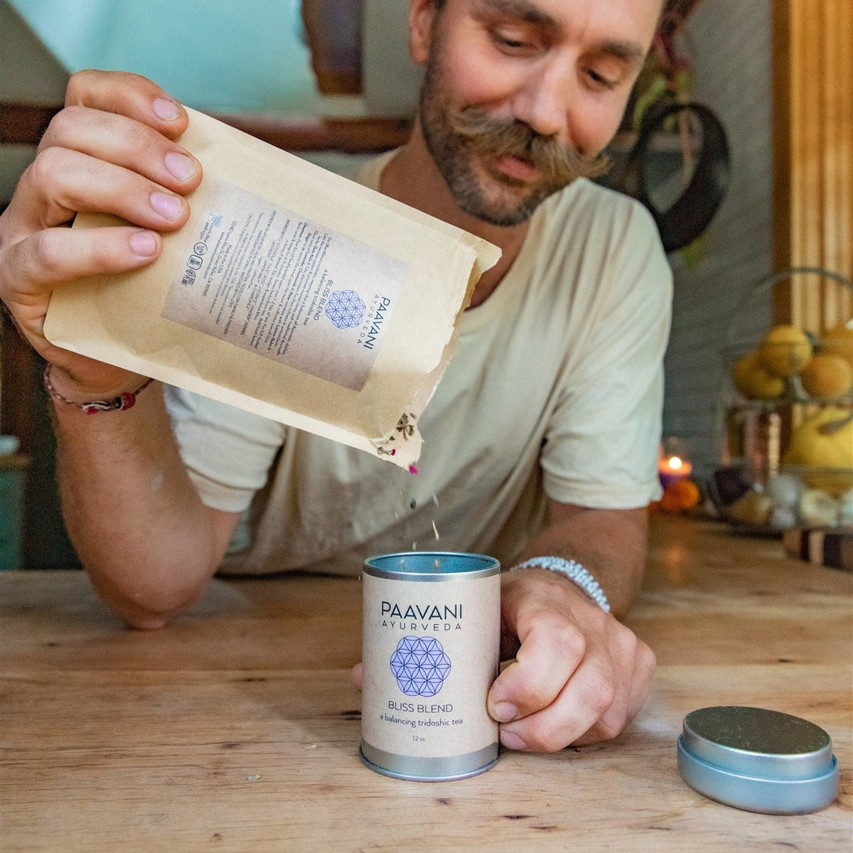 Paavani Ayurveda Bliss Blend tridoshic tea for relaxation and harmony, featuring herbal ingredients in a simple, calming presentation.