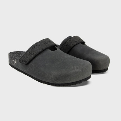 Pair of Fleks More Mesa Clogs in After Dark color, featuring a stylish slip-on design and durable construction.
