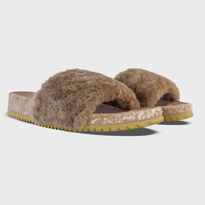 Fleks San Ysidro Slide in Blushed, featuring soft pink straps and a comfortable slip-on design, shown from a side angle.