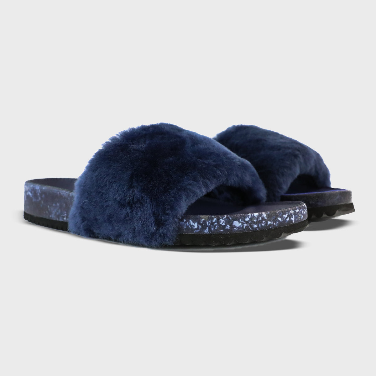 Fleks San Ysidro Slide in deep blue sea color, showcasing the stylish slide sandal with adjustable straps and comfortable design.