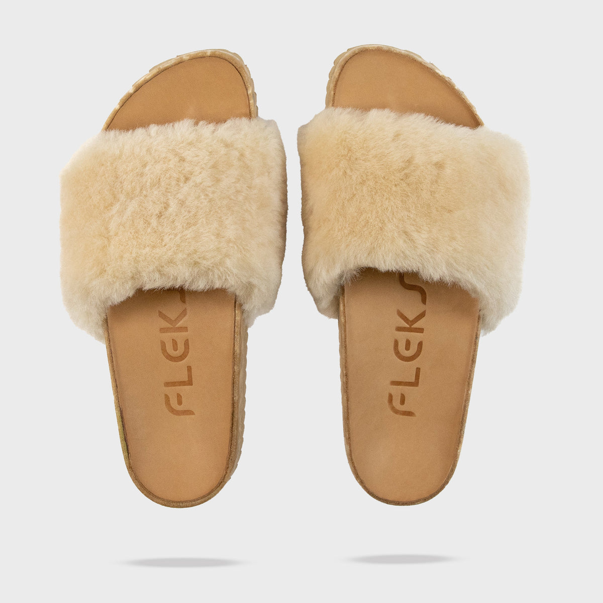 Fleks San Ysidro Slide in tan with a heel shadow design, perfect for casual mornings and comfortable summer wear.
