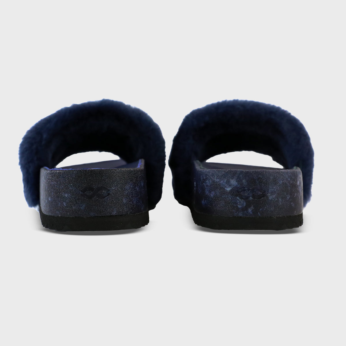 Rear view of Fleks San Ysidro Slide in Deep Blue Sea, showcasing the stylish blue slide design and comfortable footbed.