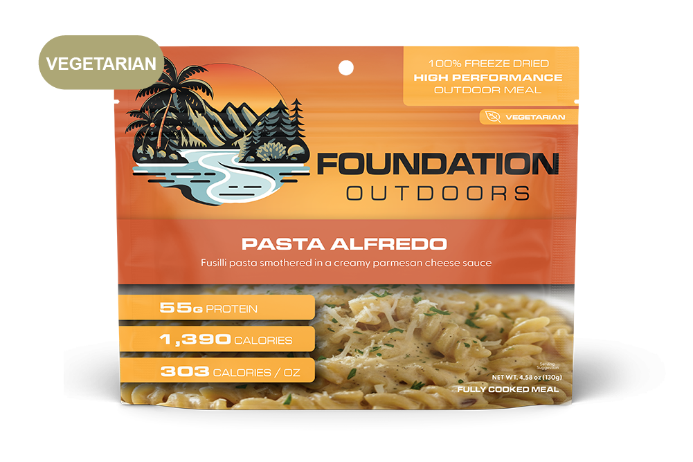 Creamy Pasta Alfredo meal by FOUNDATION Outdoors, featuring al dente pasta coated in rich Alfredo sauce in a ready-to-eat serving.