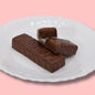 AmBari Nutrition Mint Cocoa Bars with peppermint and chocolate coating, showing crunchy texture and mint chocolate flavor.