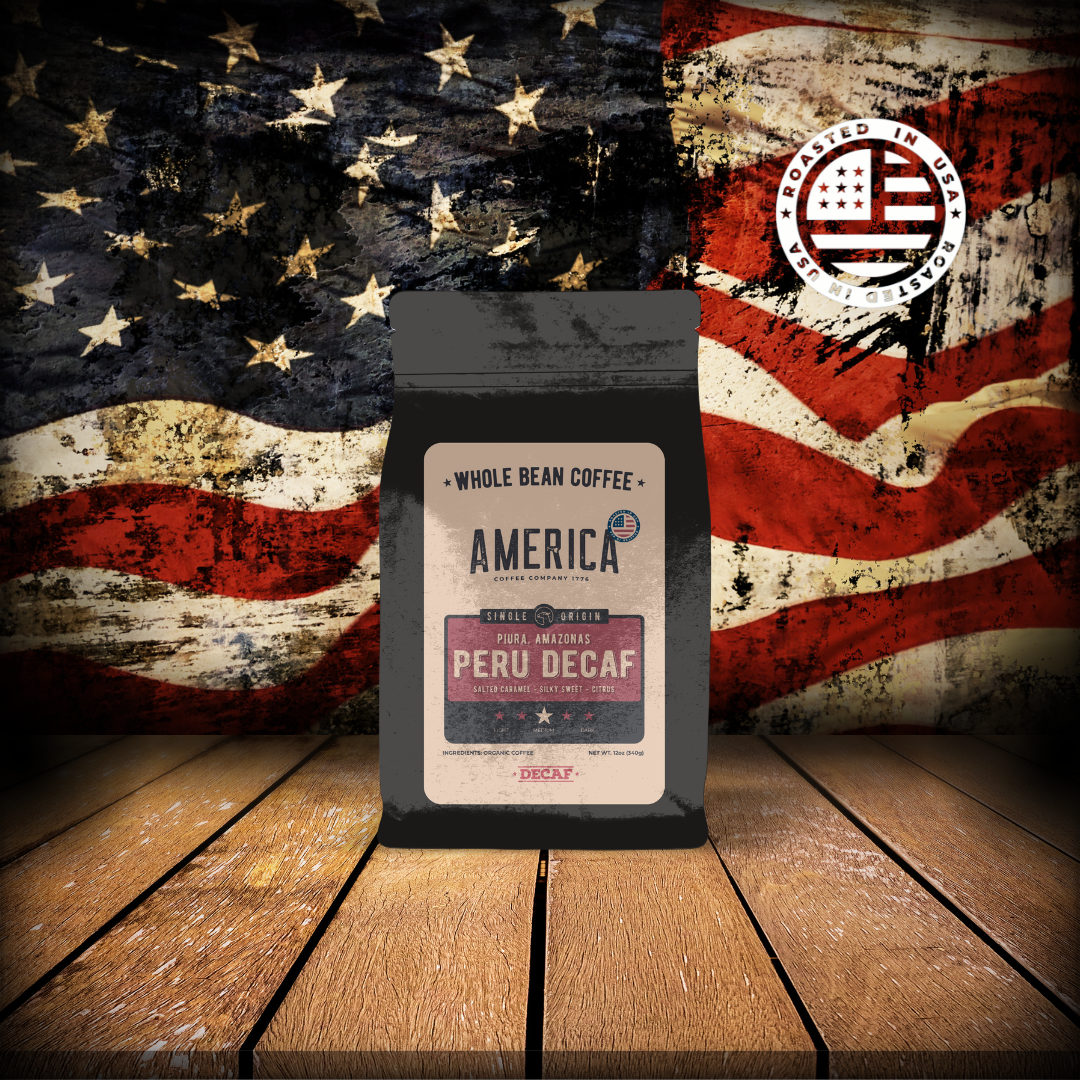 Peru Decaf single origin coffee beans from America Supply Company LLC, showcasing roasted coffee beans in a close-up shot.