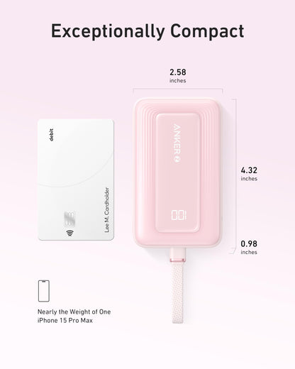 Pink Anker Zolo Power Bank with 10,000mAh capacity, 30W fast charging, and built-in 5.4-inch USB-C cable.
