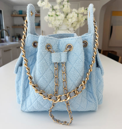 Small Bayshore Bucket in powder blue by BEACH HAUS, featuring a sturdy design with a smooth powder blue finish.