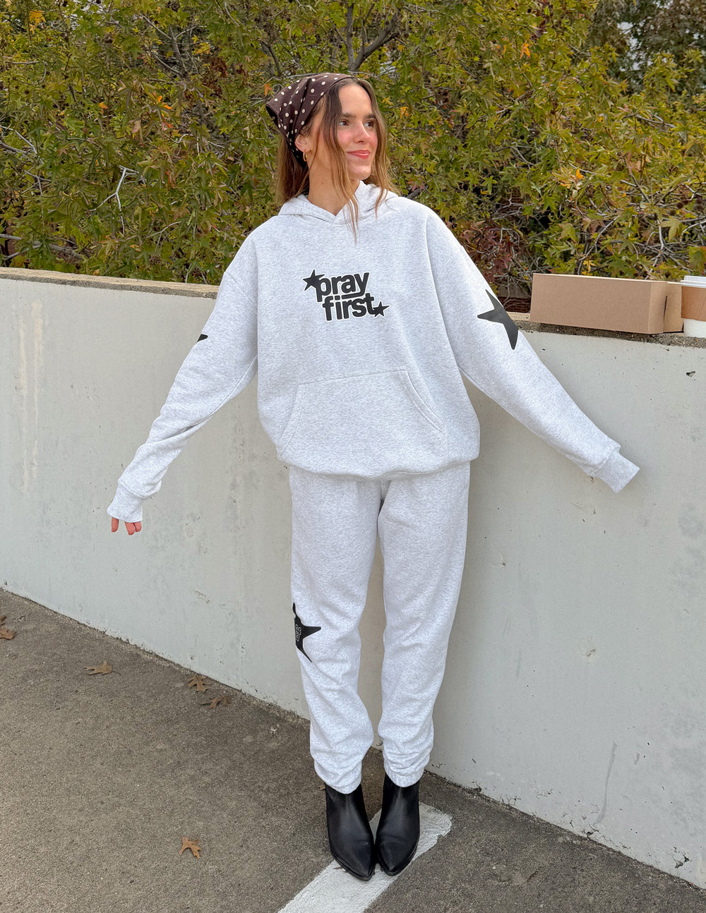 Unisex hoodie by Elevated Faith featuring a prayer-themed design, comfortable fit, and casual style for everyday wear.