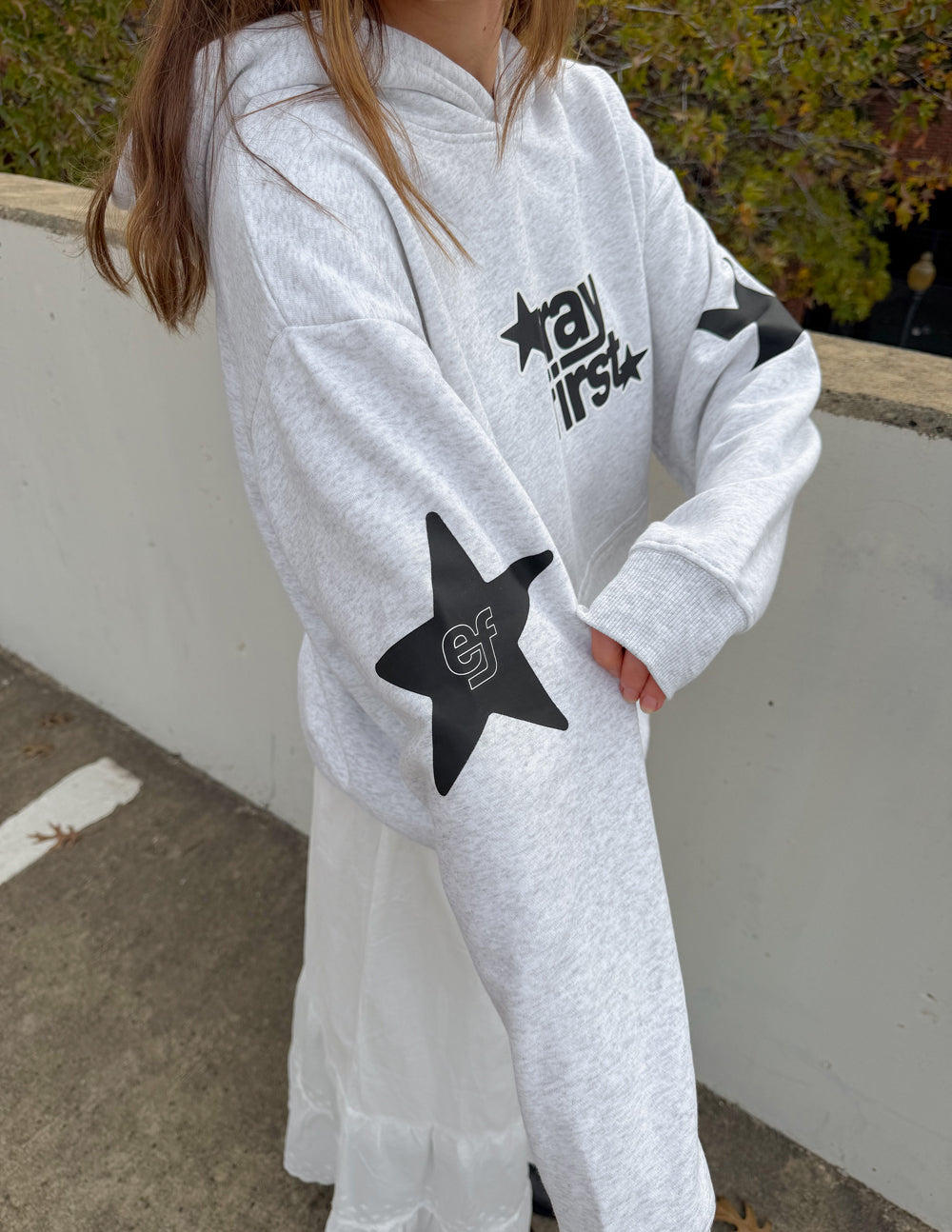 Elevated Faith Pray First unisex hoodie featuring a comfortable design and printed prayer message on the front.