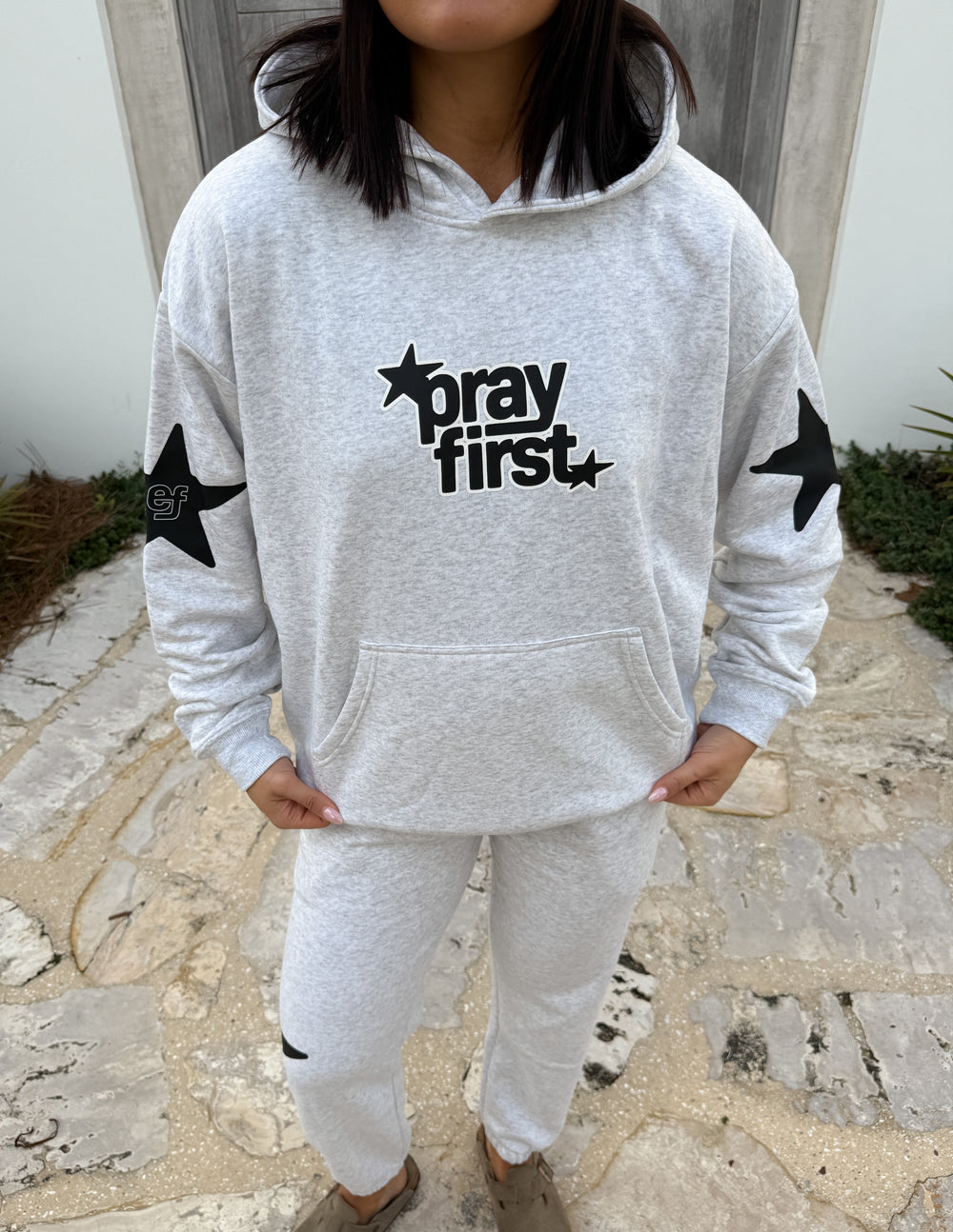 Unisex Pray First hoodie by Elevated Faith, featuring a comfortable fit and prayer-themed design in soft fabric.