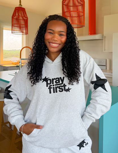 Unisex Pray First Hoodie by Elevated Faith featuring a comfortable fit and motivational prayer design.