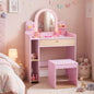 Pink kids vanity table set with LED mirror, stool, and pretend makeup accessories for children.