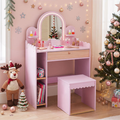 Kids pink vanity table set with LED mirror and stool, featuring pretend makeup accessories and a playful, child-friendly design.