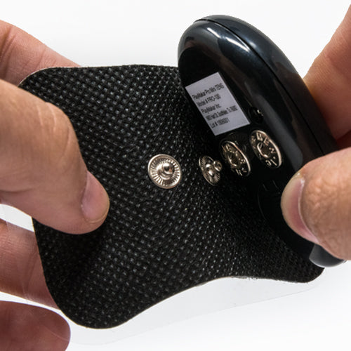 iReliev WiTENS Mini Wireless TENS unit with compact design and control buttons, used for pain relief therapy.