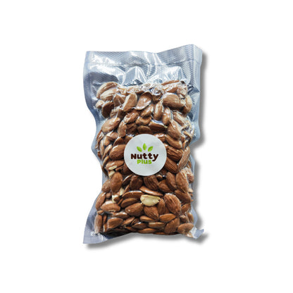 Shelled Avola almonds from Nutty, showcasing glossy, crunchy dried almonds in a 300g package for snacking or baking.