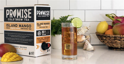 Java House Promise Tea Island Mango Cold Brew Tea in 1-gallon jug with vibrant mango flavor and refreshing tea appearance.
