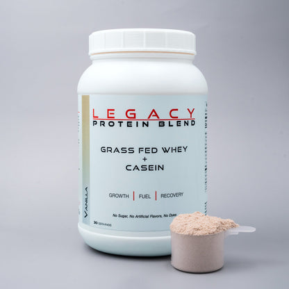 Vanilla-flavored Legacy Grass-Fed Protein Blend scoop in a jar, part of Legacy Performance vitamins and supplements.
