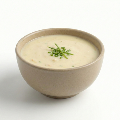 Cream of Chicken Soup from AmBari Nutrition, a savory foods product in a bowl with creamy texture and tender chicken pieces.