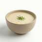 Cream of Chicken Soup from AmBari Nutrition, a savory foods product in a bowl with creamy texture and tender chicken pieces.