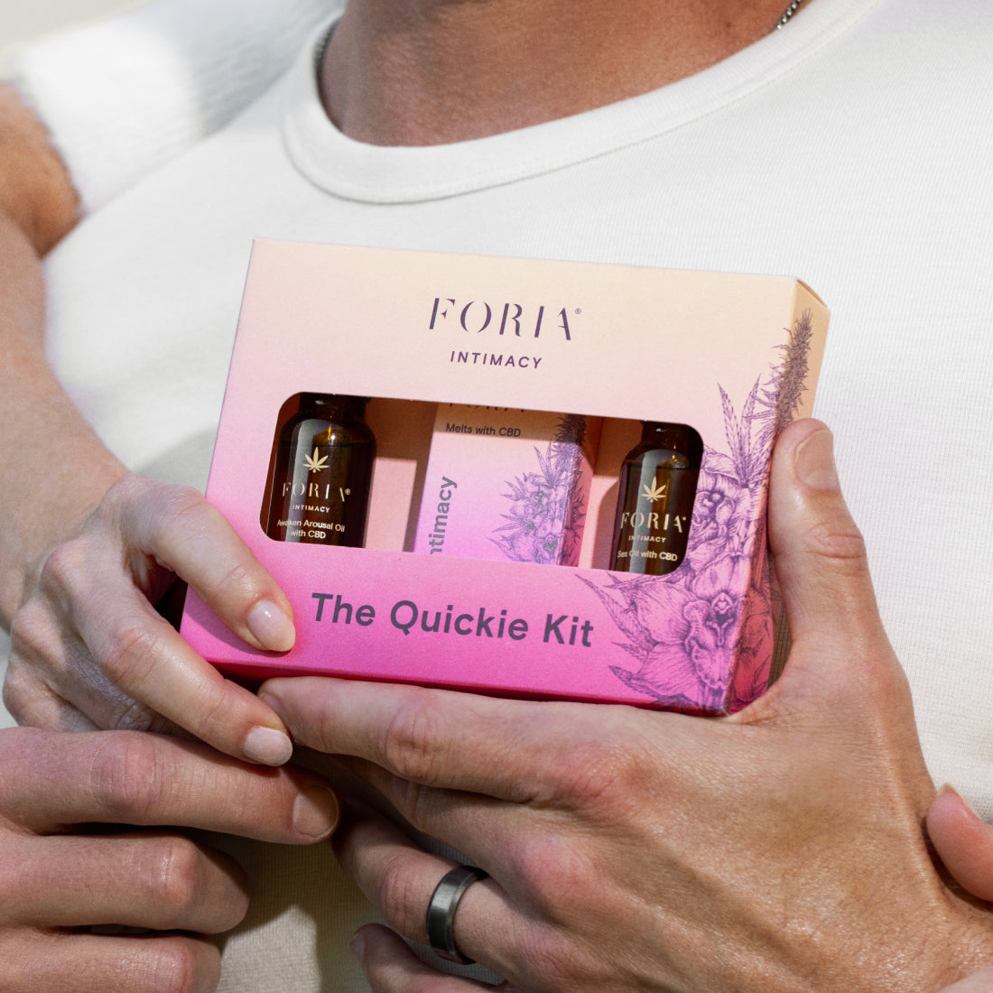 Foria Quickie Kit featuring personal care products, shown in a lifestyle setting with natural elements and modern packaging.