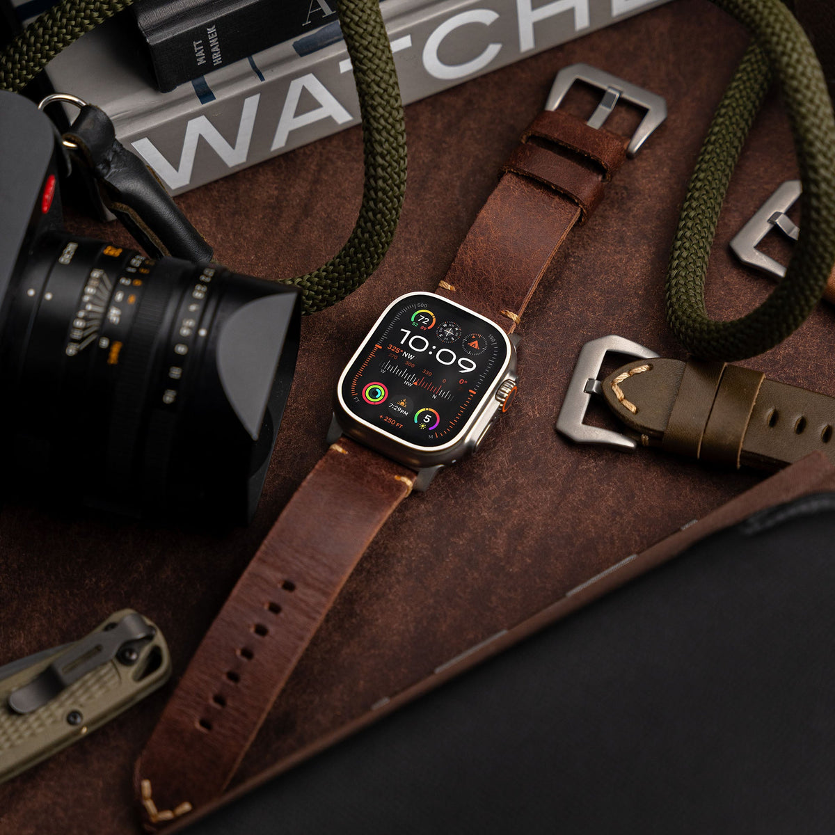 Robust Leather Strap R01 in brown, flatlay view showing its textured leather surface and sturdy buckle design.