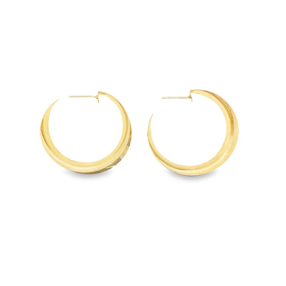 18K gold-filled curved wide minimalist hoops by MIA Jewelry, showcasing sleek, modern hoop earrings.