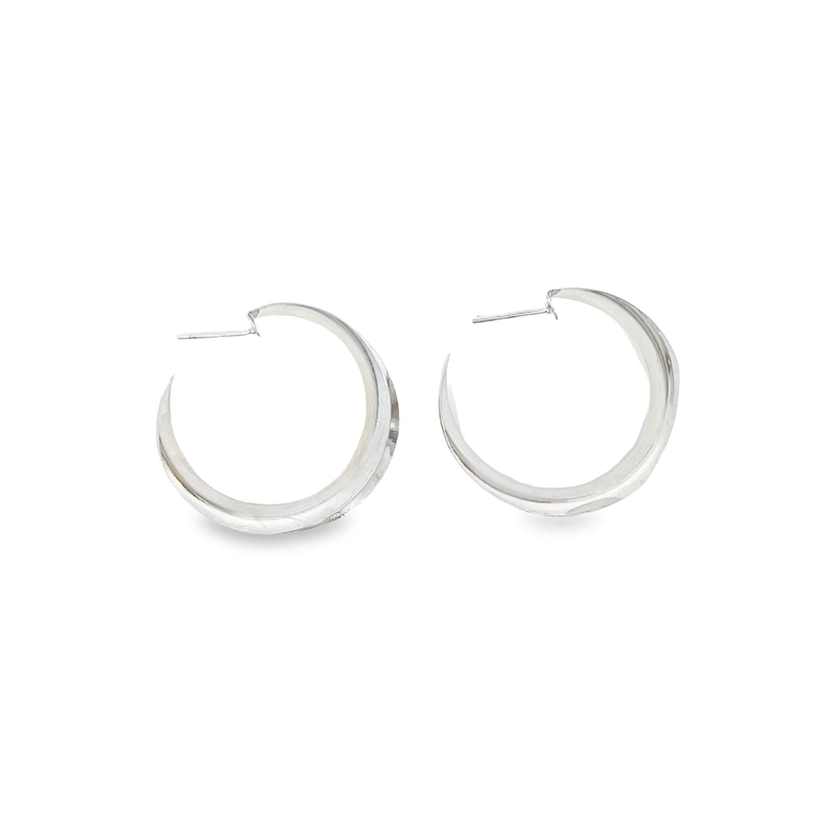 18K gold filled minimalist curved wide hoops by MIA Jewelry, showcasing smooth, polished gold hoops with a modern, curved design.