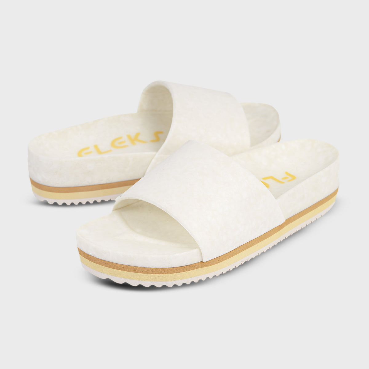 Fleks East Beach Slide Platform in Chamois color, featuring a cushioned slide sandal with a platform sole and open toe design.