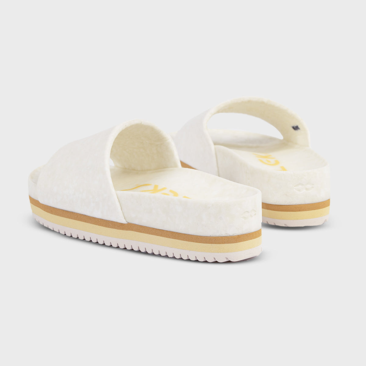 Fleks East Beach Slide Platform in chamois color, featuring a comfortable slip-on design and platform sole.