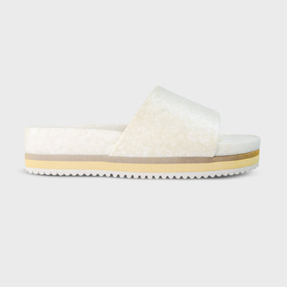 Fleks East Beach Slide Platform in chamois color with single strap design, showcasing a casual slip-on sandal with a platform sole.
