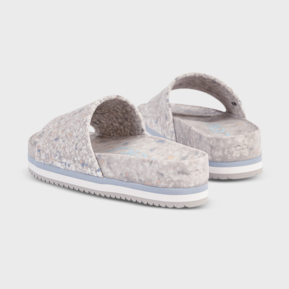 Fleks East Beach Slide Platform in faded denim, rear view showing cushioned sole and stylish slip-on design.