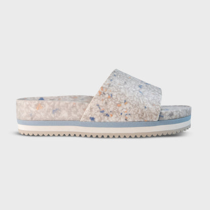 Fleks East Beach Slide Platform in faded denim, showcasing a casual slip-on sandal with a platform sole and denim strap design.