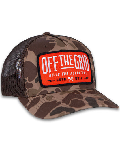 Off The Grid Surplus Ranch Hand Hat in bark duck camo, showcasing a sturdy brown hat with camouflage pattern and wide brim.