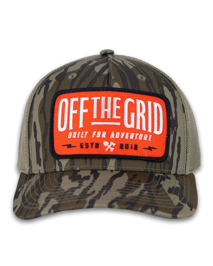 Off The Grid Surplus Ranch Hand Hat in Mossy Oak camouflage, featuring a wide brim and rugged design for outdoor wear.