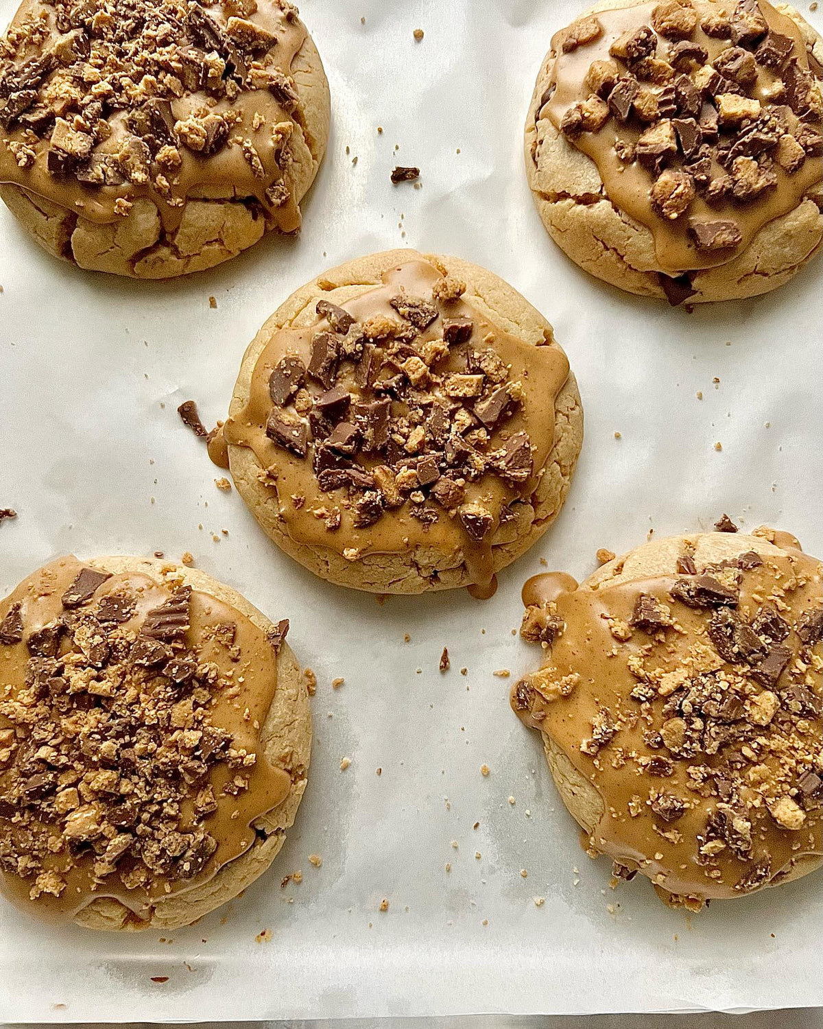 Let's Get Baked Artisan Desserts Reese's Peanut Butter Cookies with creamy peanut butter filling and chocolate coating.