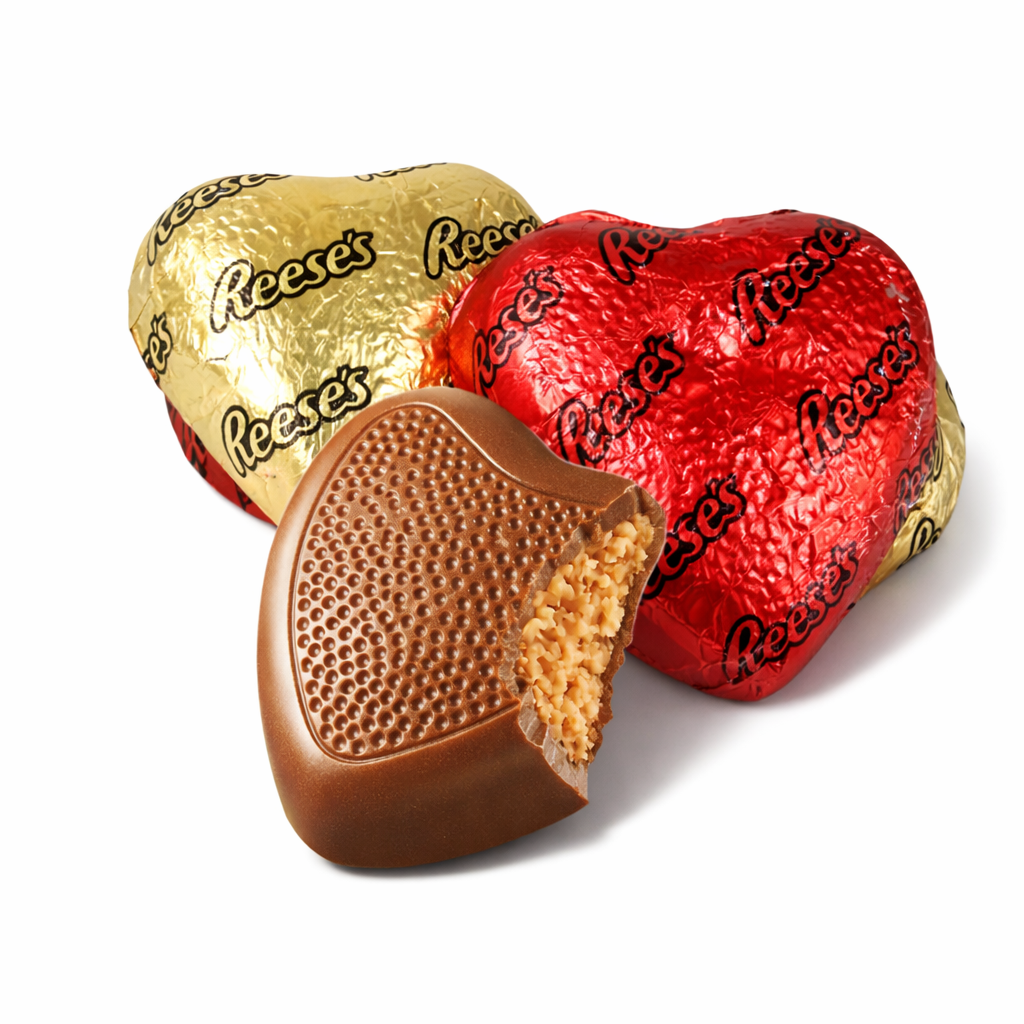 Milk chocolate Reese's Peanut Butter Hearts from Candy In Bulk in a large value bag, showing individually wrapped peanut butter chocolates.