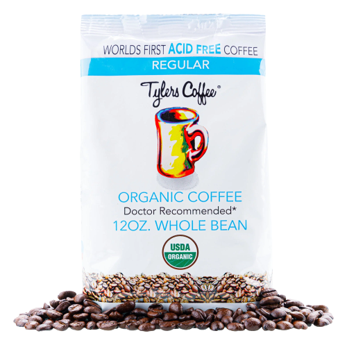 Whole bean acid-free coffee by Tylers Coffees, showcasing fresh, unground coffee beans with a smooth, natural appearance.