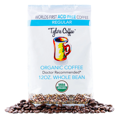 Whole bean acid-free coffee by Tylers Coffees, showcasing fresh, unground coffee beans with a smooth, natural appearance.