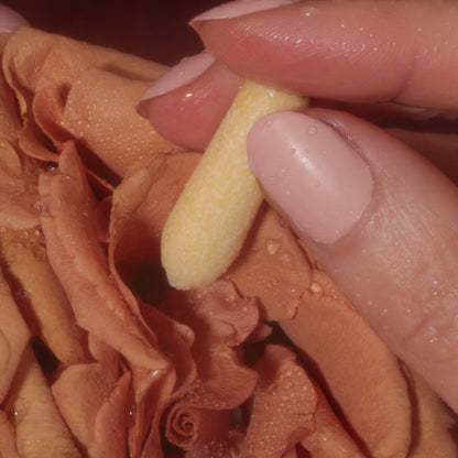 Foria Relief Melts with CBD showing the textured, melt-in-your-mouth form of the product on a neutral background.