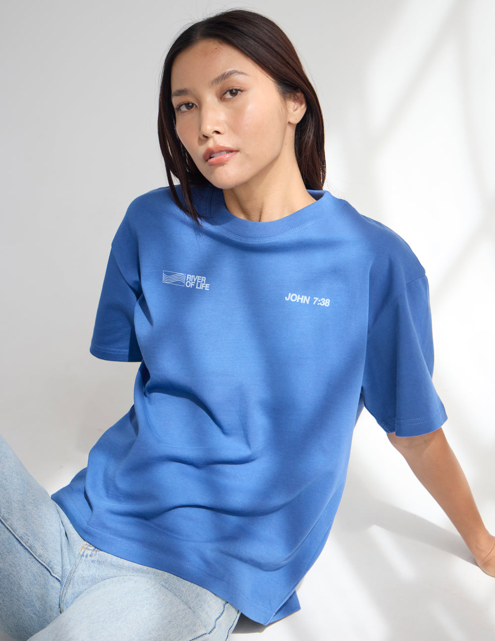 Elevated Faith River of Life heavyweight T-shirt featuring a vibrant river design on the front.