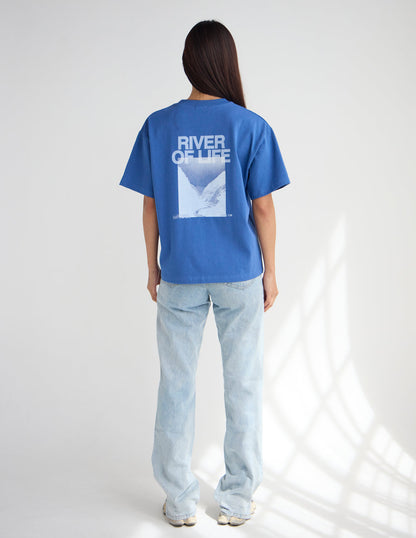 Black heavyweight T-shirt with River of Life graphic design from Elevated Faith, featuring vibrant river and spiritual imagery.