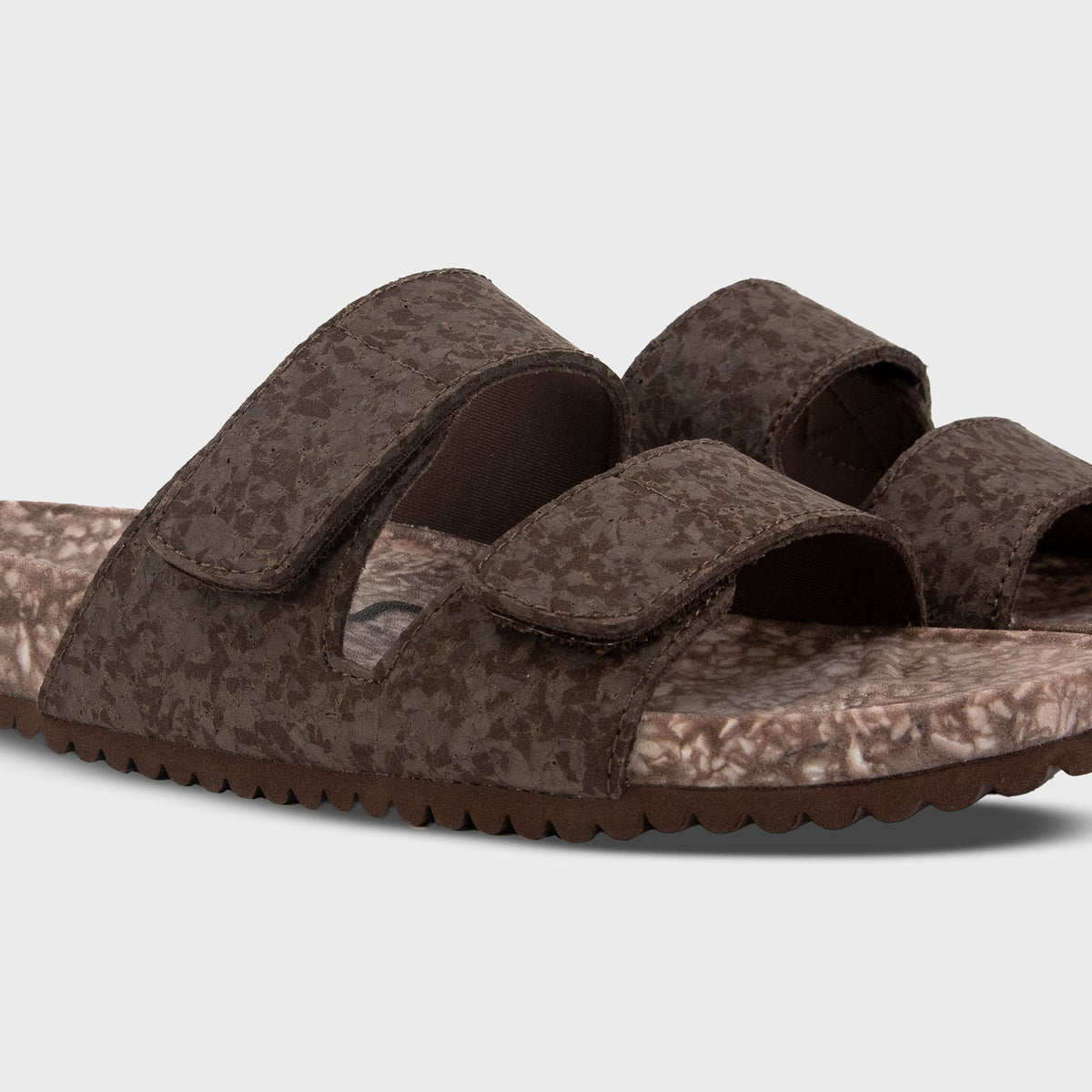 Pair of Fleks Riviera Sandals in Coconut Shell color, featuring a casual strap design and textured sole.