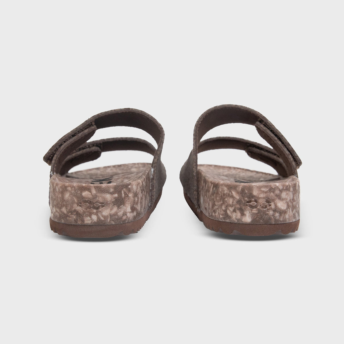 Rear view of Fleks Riviera Sandal in Coconut Shell with white strap and textured sole, showcasing the casual beach footwear.