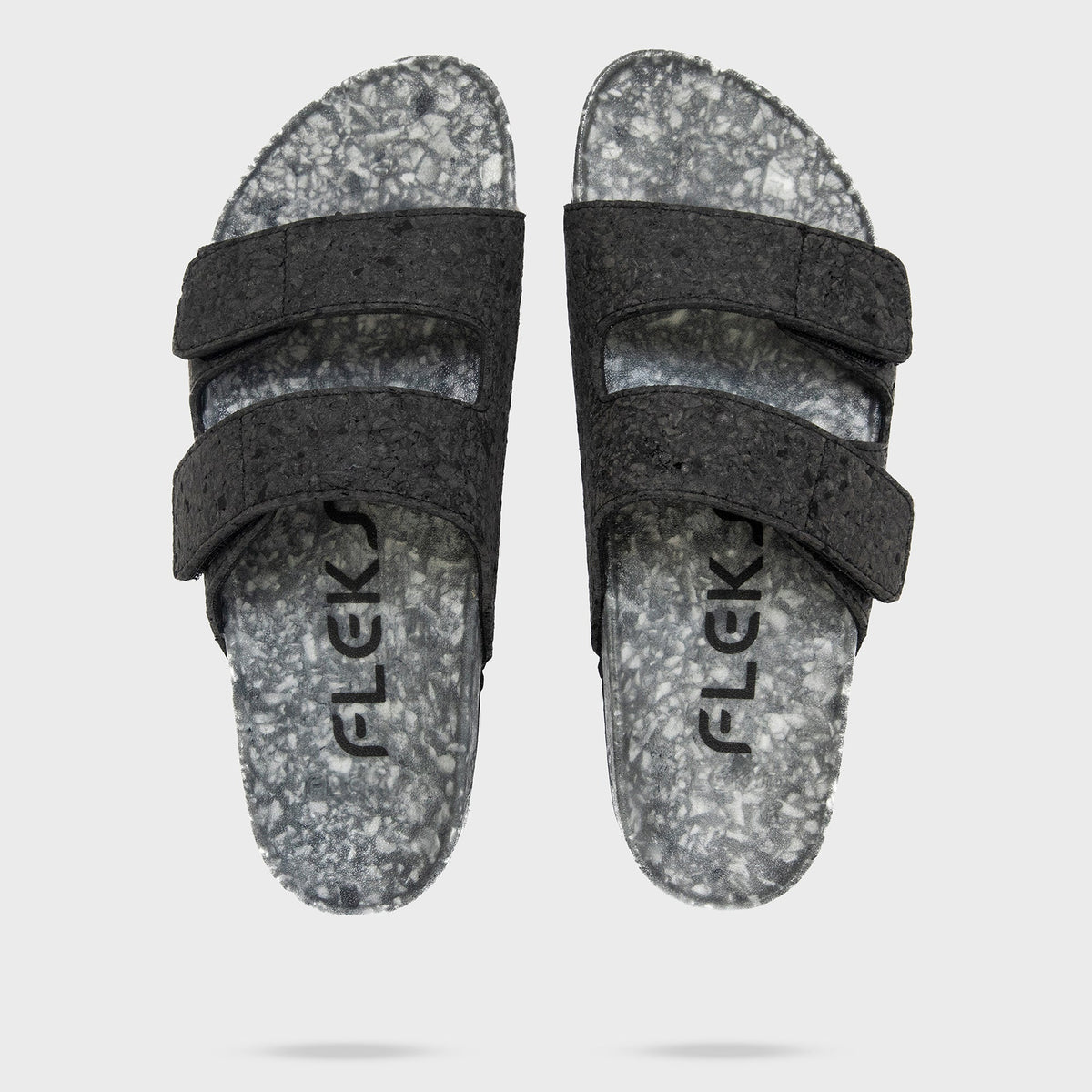 Pair of Fleks Riviera Sandals in Nightfall color, top-down view showing stylish straps and footbed with shadow detail.