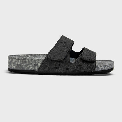 Riviera Fleks Nightfall sandal featuring a sleek profile, dark color, and stylish design suitable for casual wear.