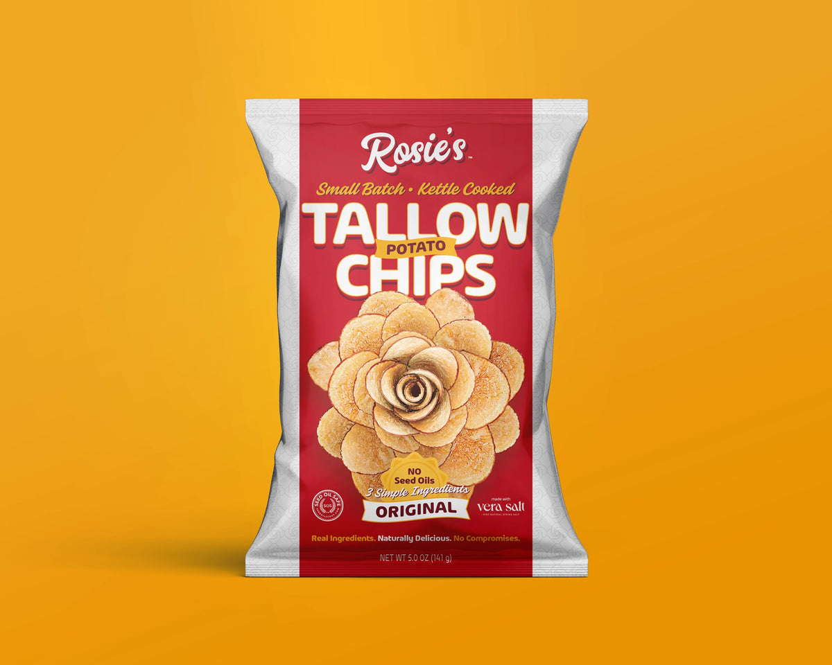 Bowl of crispy Rosie's Chips potato chips with ridged texture, golden color, and scattered chips on a neutral background.