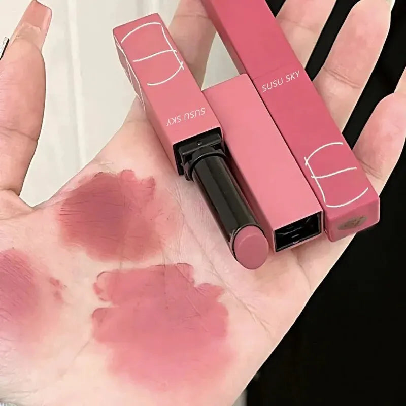 Blushimmer TX010 matte lipstick and blush stick, waterproof and long-lasting, suitable for lips and cheeks, in sleek tube packaging.