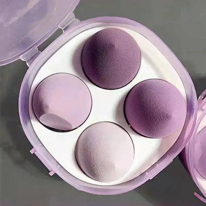Set of four Blushimmer beauty egg makeup sponges with egg box for foundation, cream, and powder application on a white background.